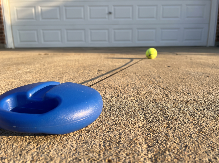 Put it on flat ground, right by your feet.